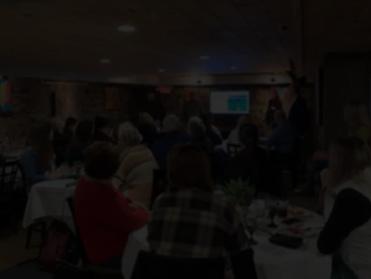 Photo of people at banquet tables