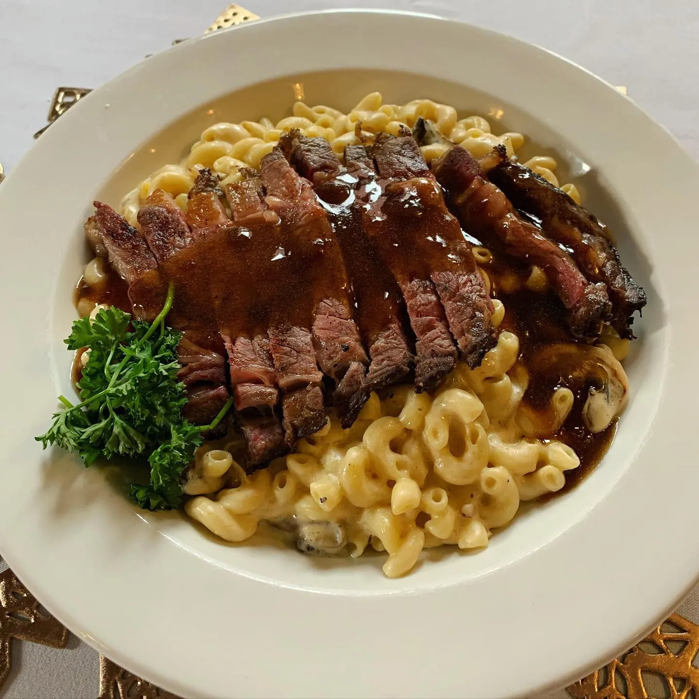 Photo of steak and mac and cheese